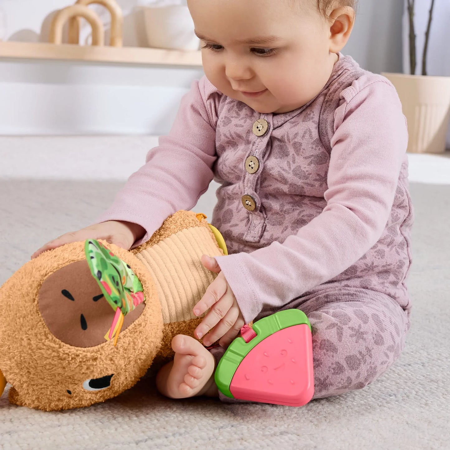 Fisher-Price Snuggly Snacky Capybara Plush Baby Sensory Toy with Teether & Rattle