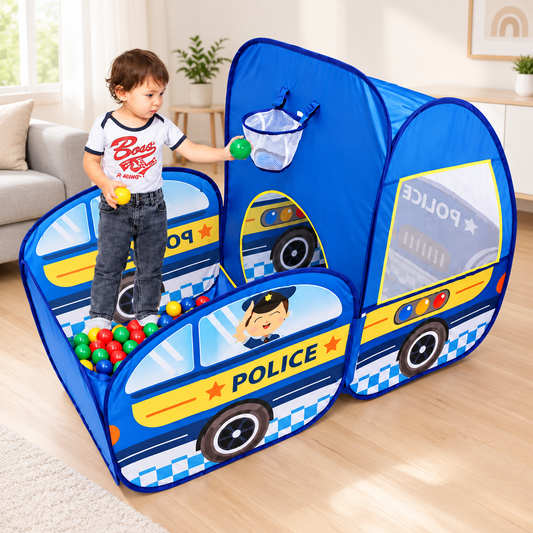 A toddler stands inside a blue police-themed ball pit play tent with a small canopy roof, holding colorful balls on a white studio background.