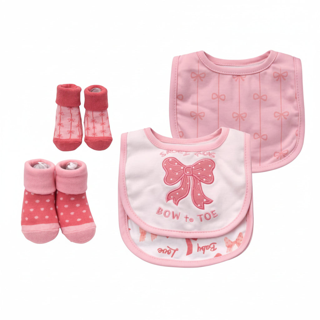 A social media post showing a baby accessory set with pink and white baby bibs and booties, accompanied by Spanish text 'SET DE BABEROS Y MEDIAS' and a 'Dulzura Kids' logo.
