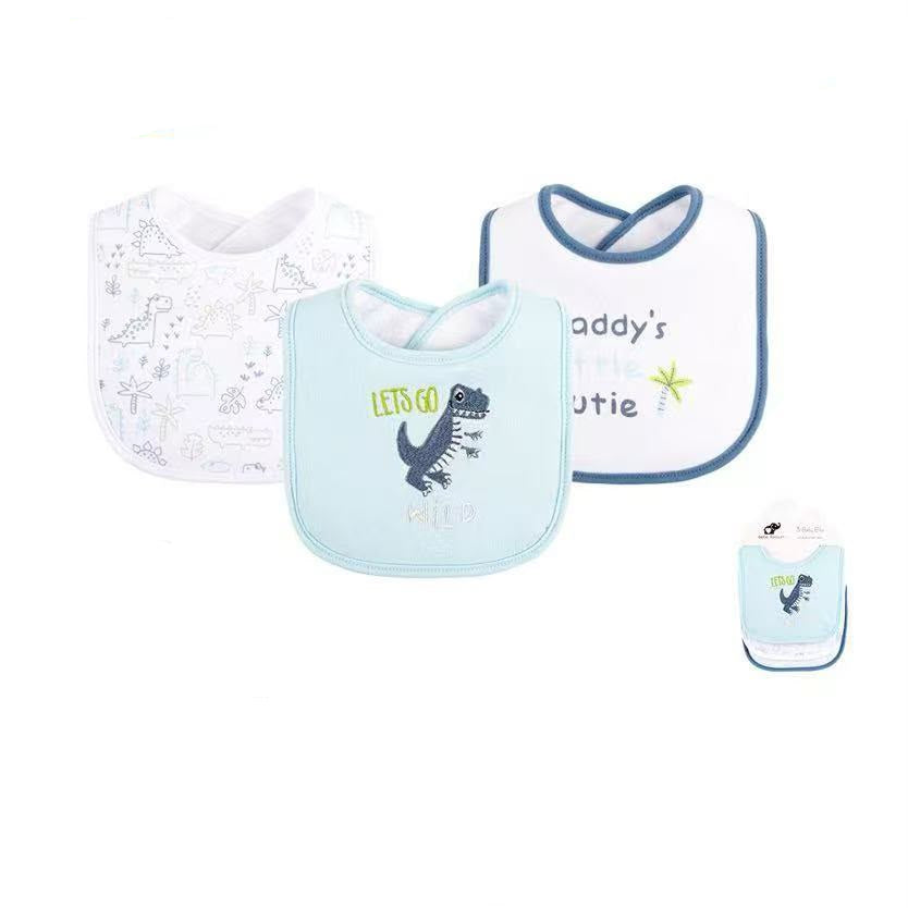 Three baby bibs shown on a white background with product text and a small packaged view. The bibs are white and light blue, with printed dinosaur and letter graphics.
